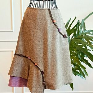 Elegant Asymmetrical Tan Skirt with Floral Accents